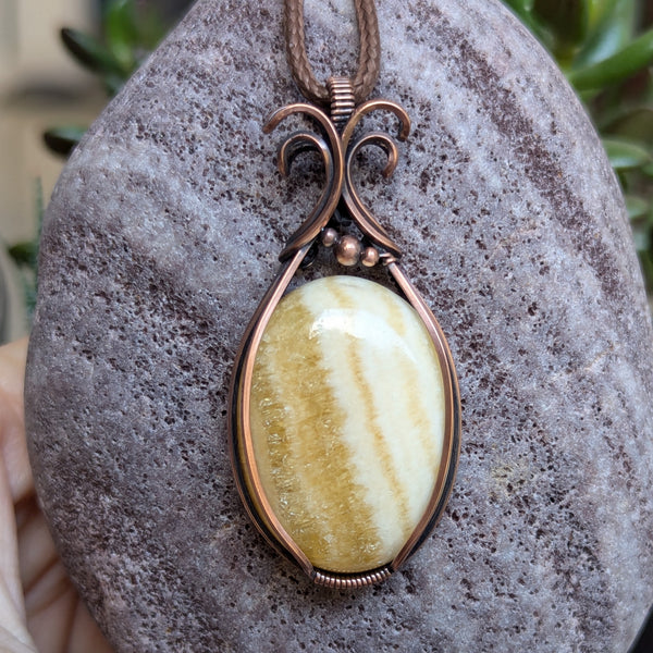 Yellow Calcite Wire Wrapped Pendant in Oxidized Copper