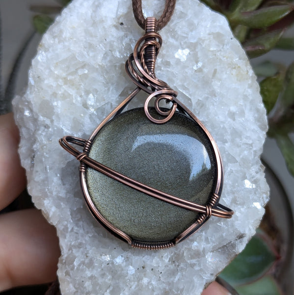 Golden Sheen Obsidian Wire Wrapped Planet Pendant in Oxidized Copper
