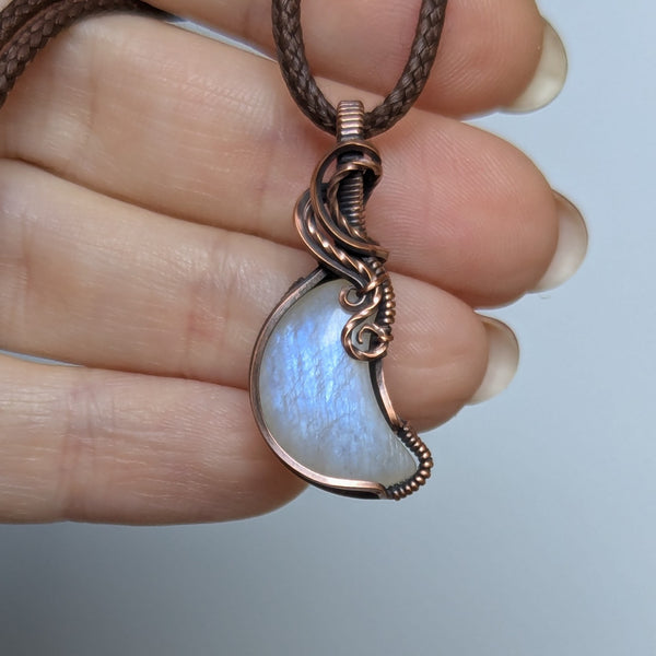 Rainbow Moonstone Crescent Wire Wrapped Pendant in Oxidized Copper