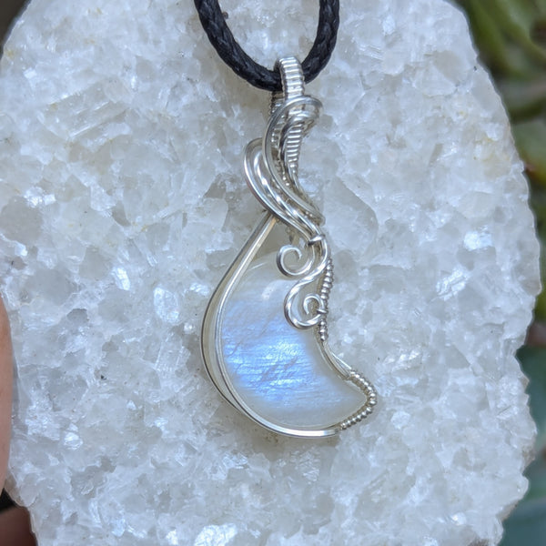 Rainbow Moonstone Crescent Wire Wrapped Pendant in Sterling Silver