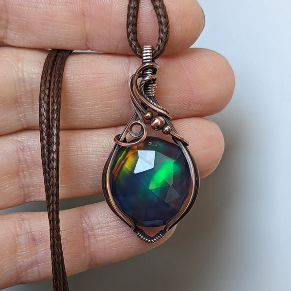 Faceted Aurora Opal doublet Wire Wrapped Oxidized Copper Pendant
