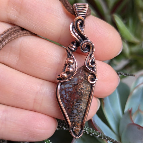 Fossilized Dinosaur Bone Wire Wrapped Oxidized Copper Pendant