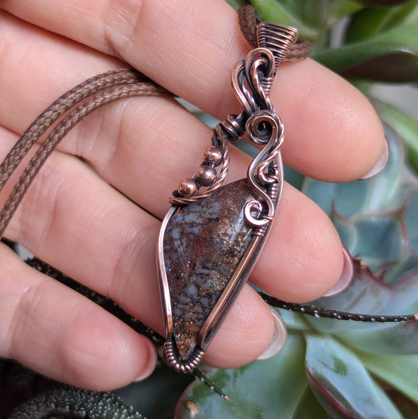 Fossilized Dinosaur Bone Wire Wrapped Oxidized Copper Pendant