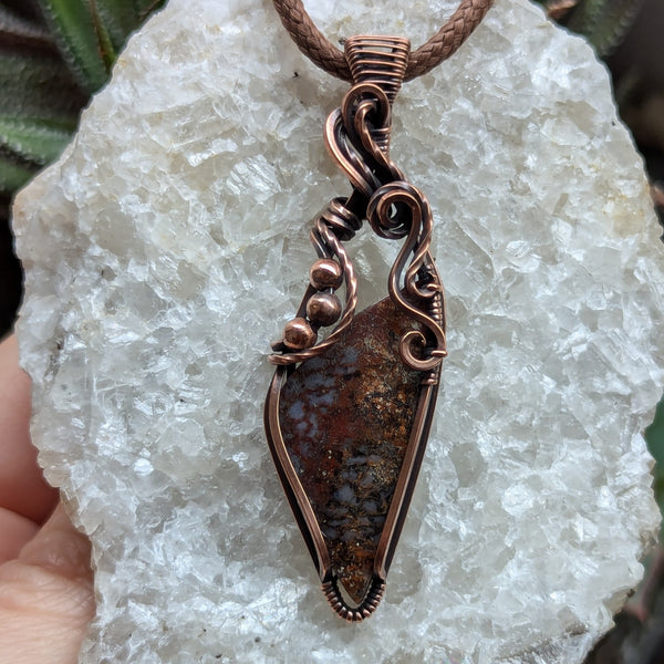 Fossilized Dinosaur Bone Wire Wrapped Oxidized Copper Pendant