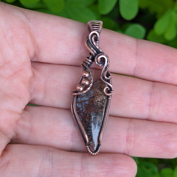 Fossilized Dinosaur Bone Wire Wrapped Oxidized Copper Pendant