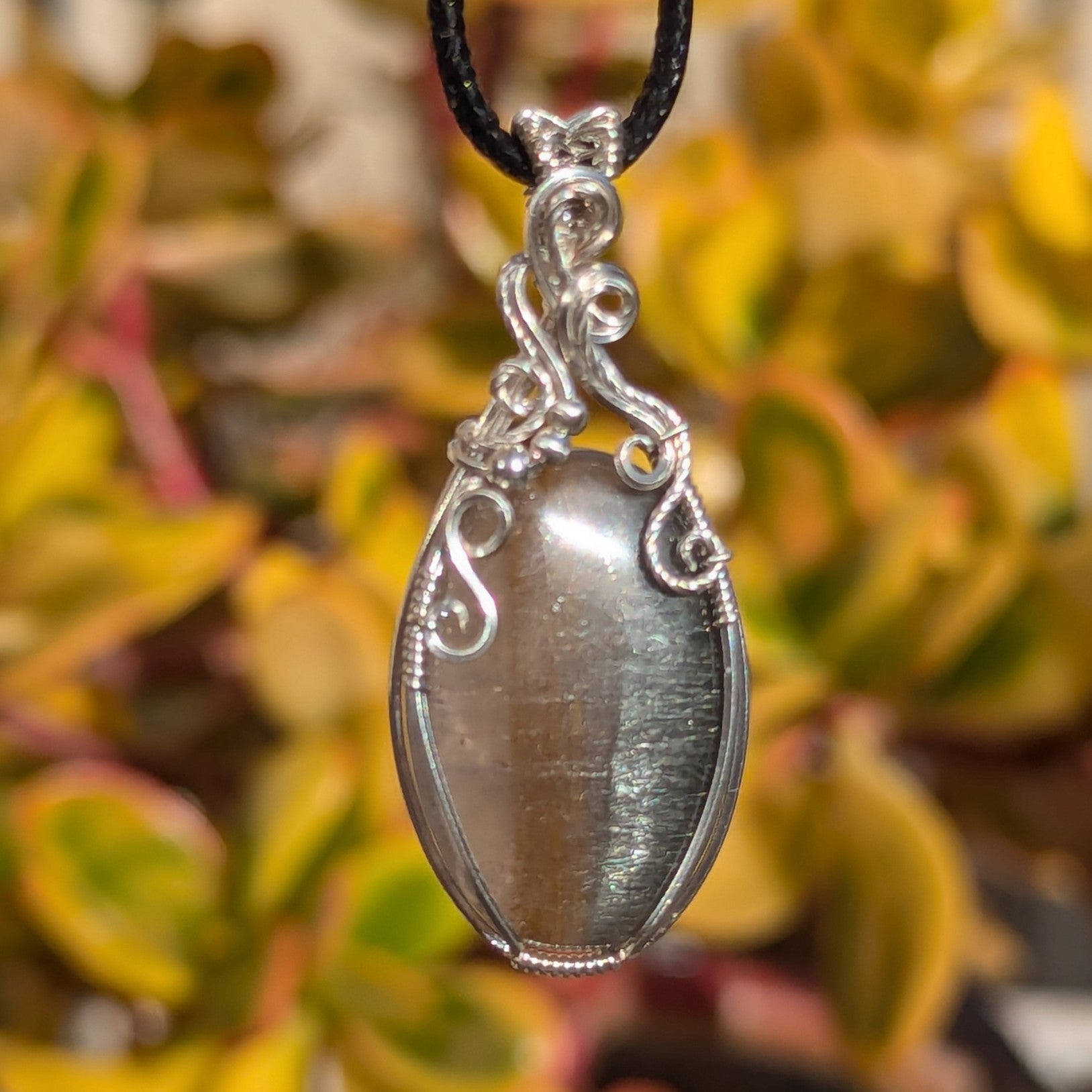 Silver Rutile Quartz Wire Wrapped Sterling Silver Pendant