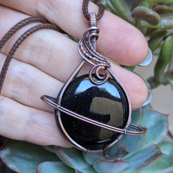 Green Goldstone Wrapped Planet Pendant in Oxidized Copper