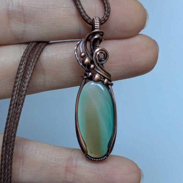 Green/Brown Chalcedony Wire Wrapped Pendant in Oxidized Copper