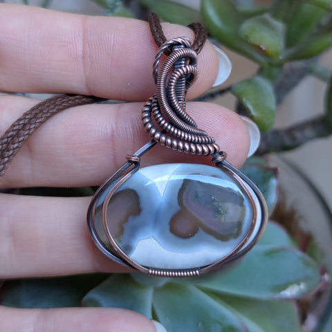 Solar Quartz Wire Wrapped Pendant in Oxidized Copper