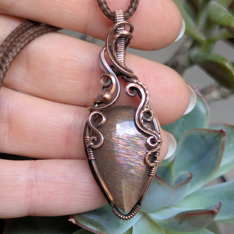 Sunstone Wire Wrapped Pendant in Oxidized Copper
