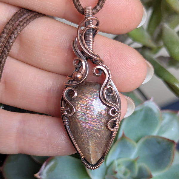 Sunstone Wire Wrapped Pendant in Oxidized Copper
