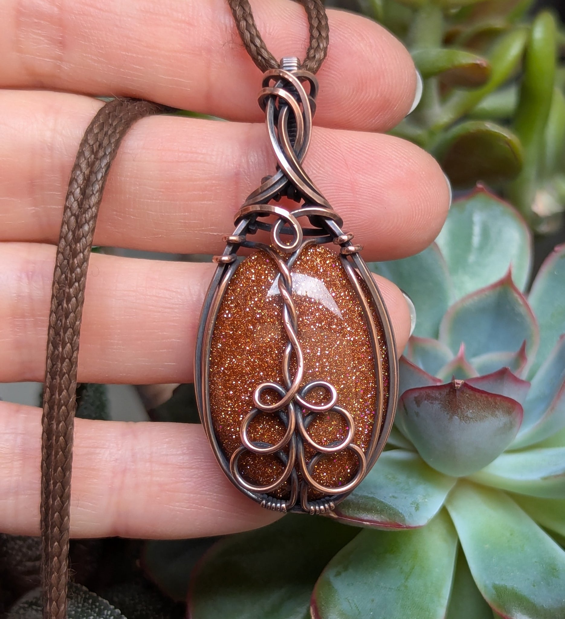 Goldstone Wire Wrapped Oxidized Copper Pendant
