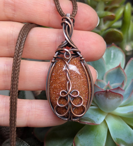 Goldstone Wire Wrapped Oxidized Copper Pendant
