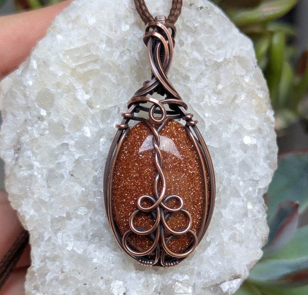 Goldstone Wire Wrapped Oxidized Copper Pendant