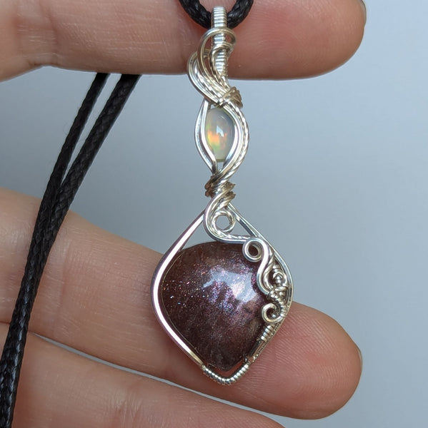 Red Sunstone & Welo Opal Wire Wrapped Pendant in Sterling Silver
