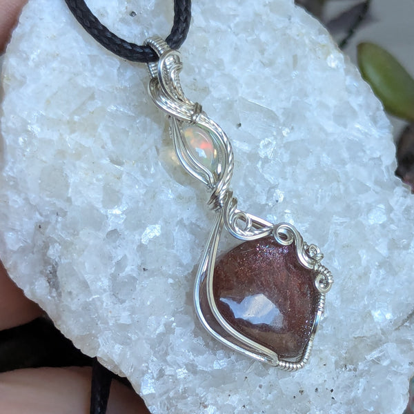 Red Sunstone & Welo Opal Wire Wrapped Pendant in Sterling Silver