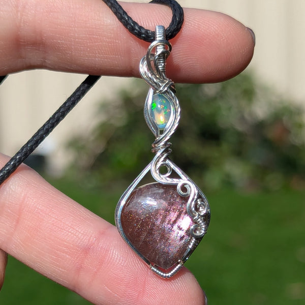 Red Sunstone & Welo Opal Wire Wrapped Pendant in Sterling Silver