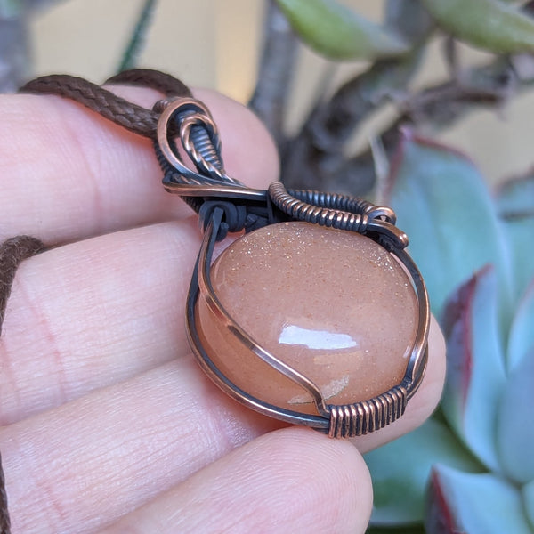 Sparkly Peach Moonstone Wire Wrapped Oxidized Copper Pendant