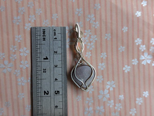 Red Sunstone & Welo Opal Wire Wrapped Pendant in Sterling Silver