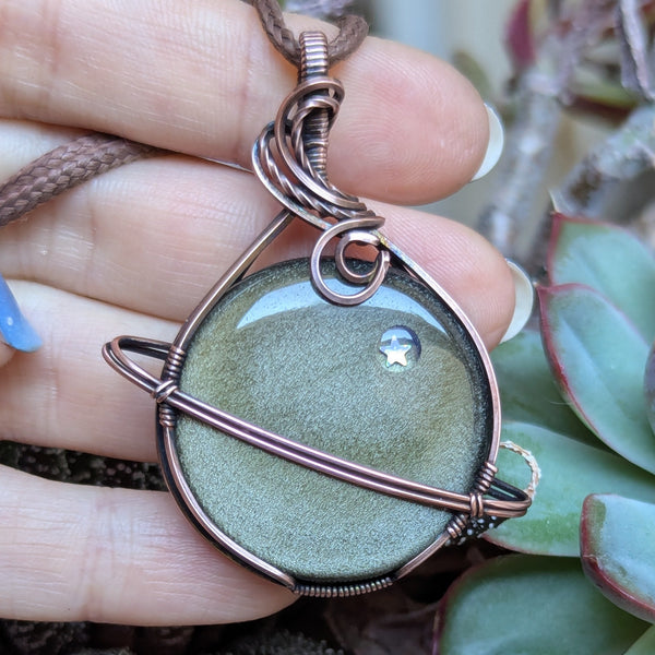 Golden Sheen Obsidian Wire Wrapped Planet Pendant in Oxidized Copper
