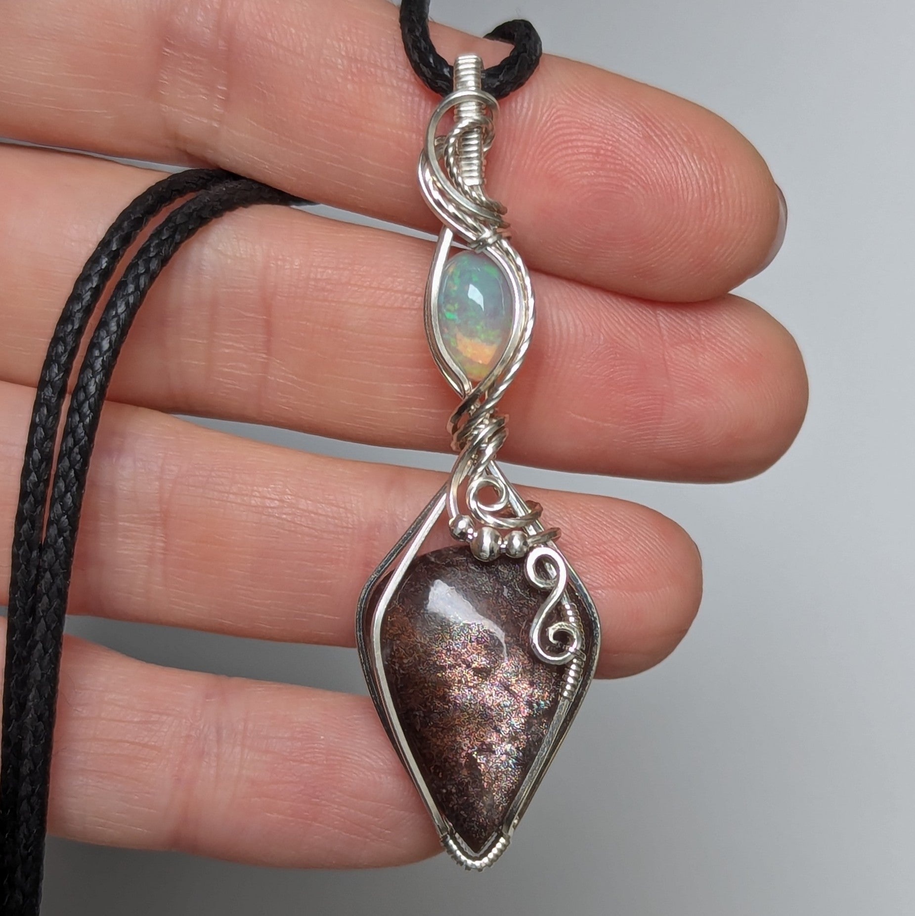 Red Sunstone & Welo Opal Wire Wrapped Pendant in Sterling Silver