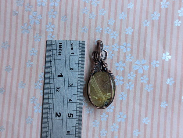 Golden Rutile Quartz Wire Wrapped Pendant in Oxidized Copper