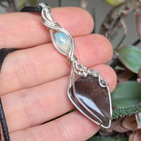 Red Sunstone & Welo Opal Wire Wrapped Pendant in Sterling Silver