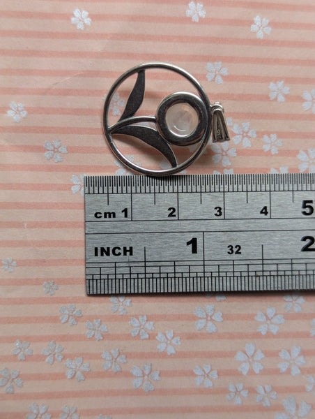 Rainbow Moonstone Flower Pendant in Sterling Silver