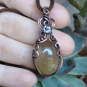 Golden Rutile Quartz Wire Wrapped Pendant in Oxidized Copper