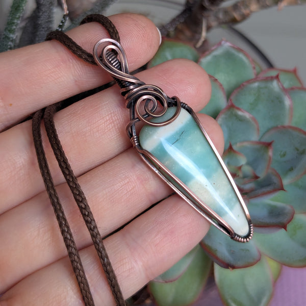 Blue Opalized Wood Wire Wrapped Pendant in Oxidized Copper