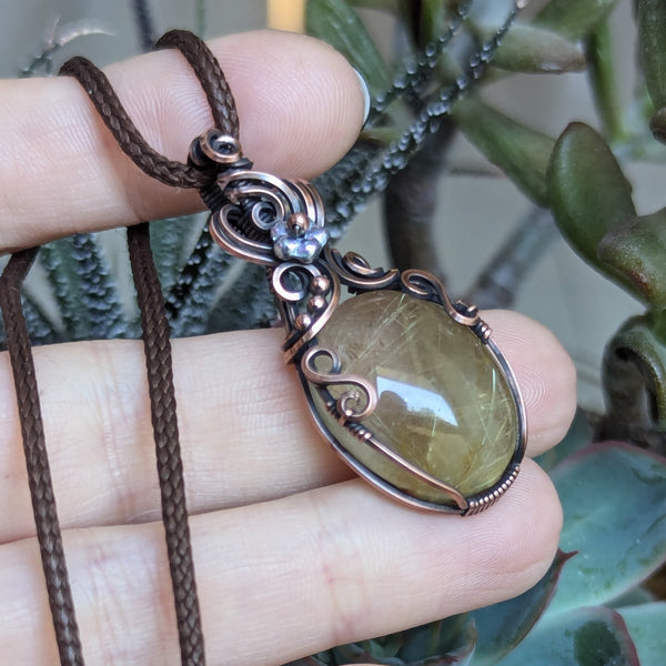 Golden Rutile Quartz Wire Wrapped Pendant in Oxidized Copper