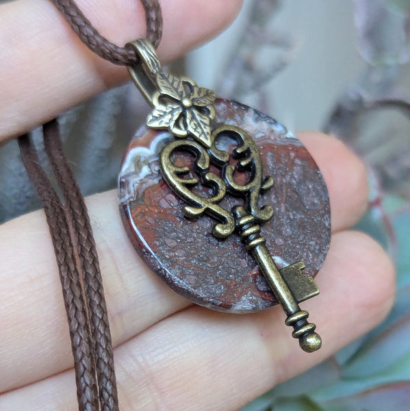 Red Jasper Pendant in Antique Brass