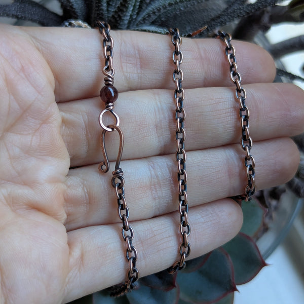 Solid Oxidized Copper Oval Cable 20" Chain with Garnet Bead