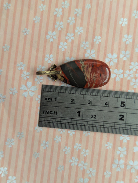 Red Jasper Pendant in Antique Brass